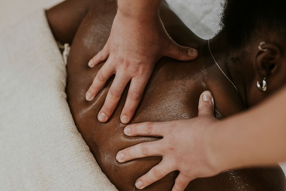 Woman getting back massage and spa, relaxation photography