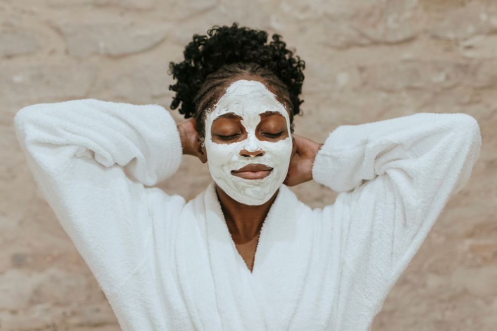 Woman in facial mask, spa day photo