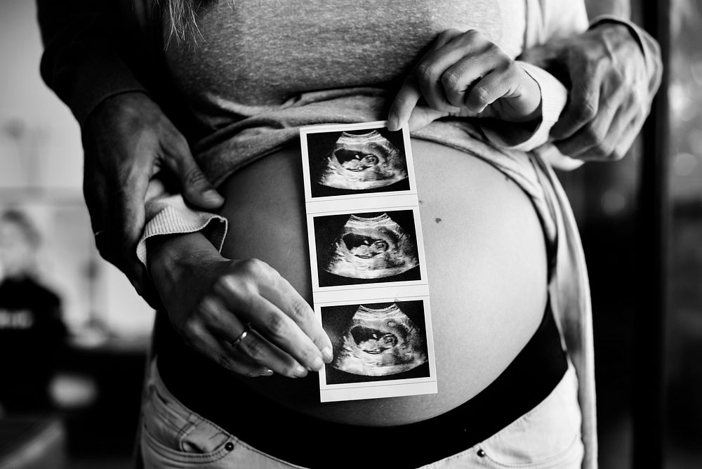 Pregnant woman and baby's photo