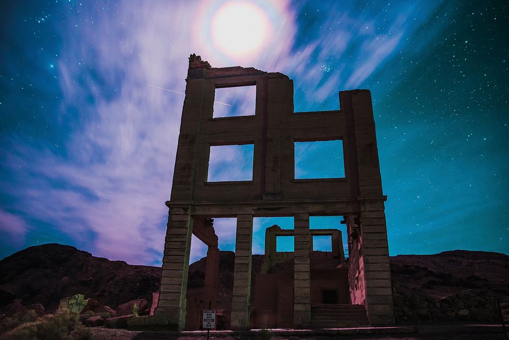 Abandoned structure under a starry sky