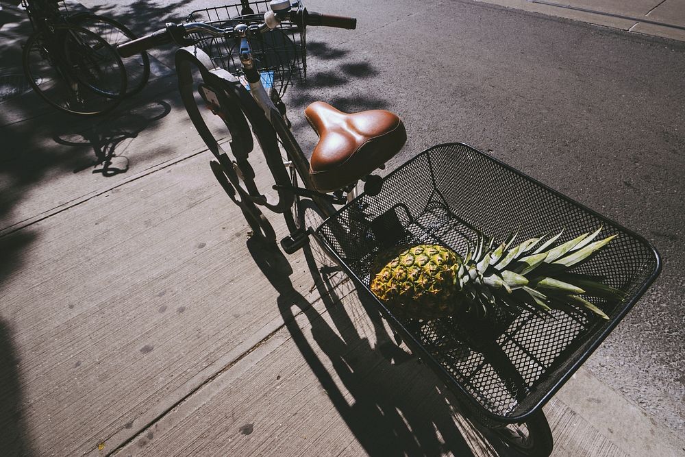 Pineapple in a bicycle basket