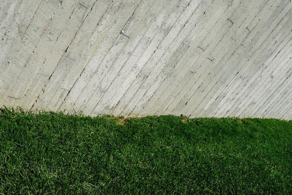 Concrete fence and grass wallpaper