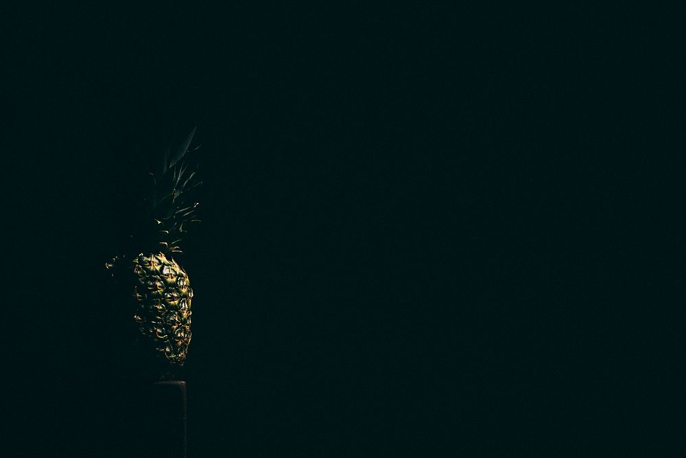 Fresh pineapple in the dark