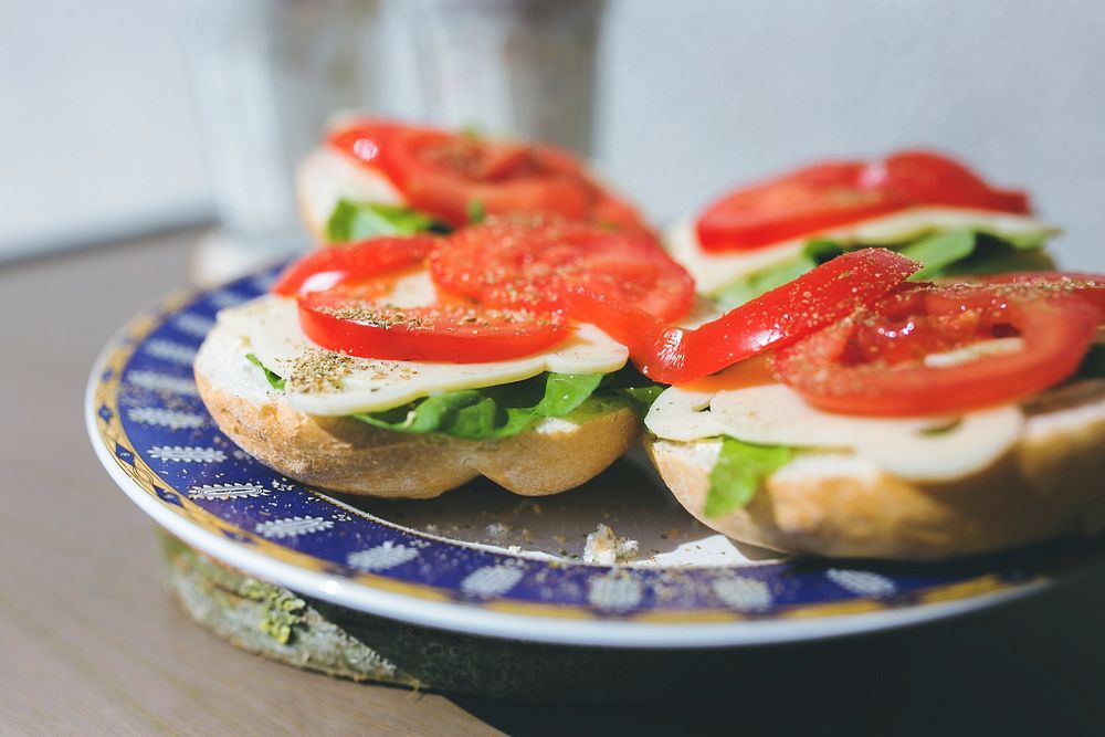 Open faced sandwiches with tomatoes. Visit Kaboompics for more free images.