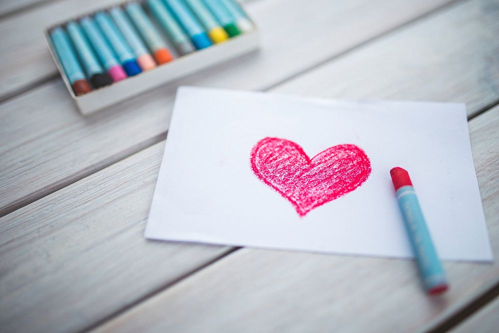 Red heart on a paper. Visit Kaboompics for more free images.