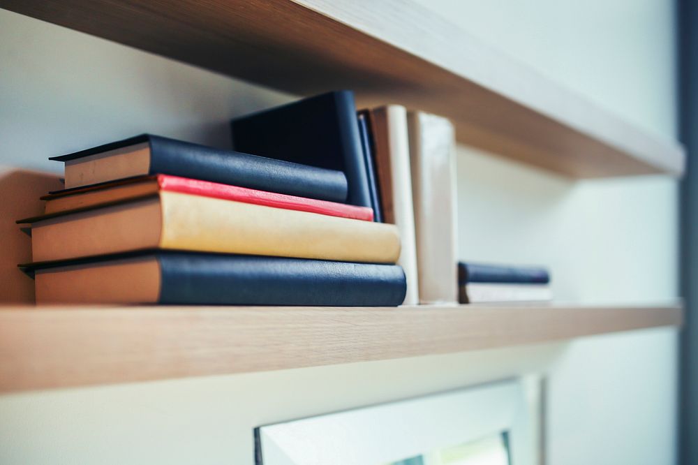 Books on a shelf. Visit Kaboompics for more free images.