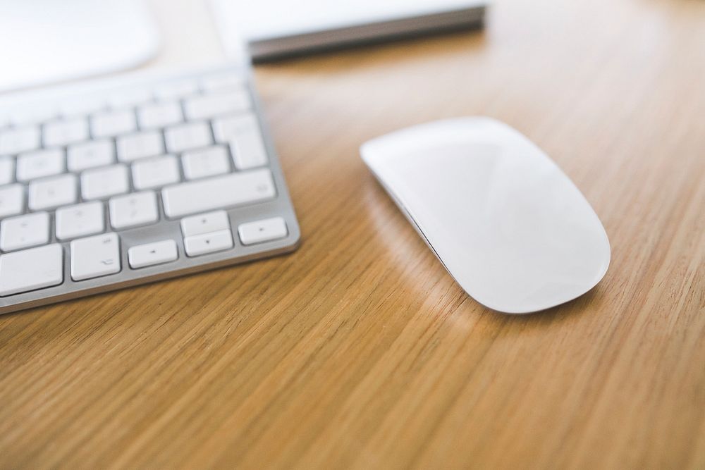 Close up of a keyboard and a mouse. Visit Kaboompics for more free images.