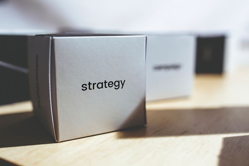 Strategy on a gray box. Visit Kaboompics for more free images.