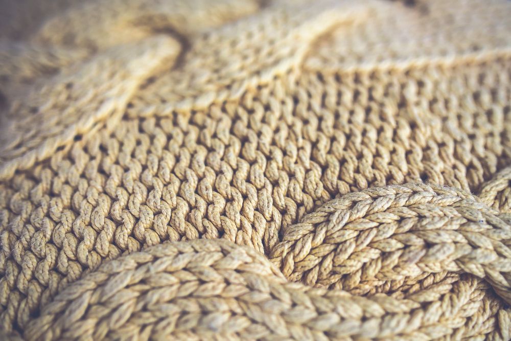 Close up of a knitted blanket. Visit Kaboompics for more free images.
