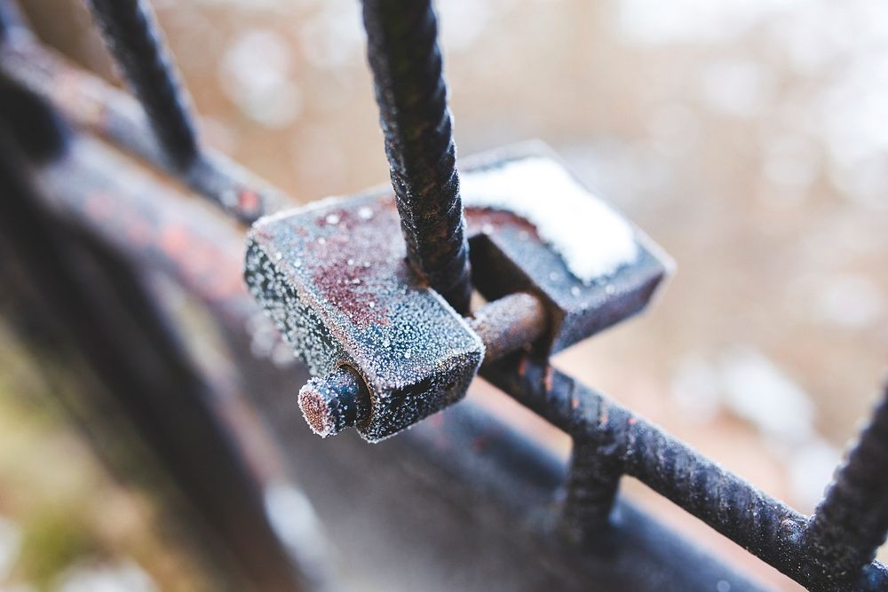 Frost on an iron gate. Visit Kaboompics for more free images.