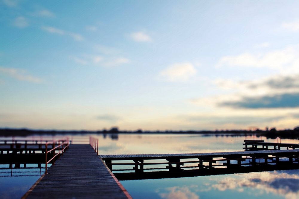 Wooden jetty at a lake. Visit Kaboompics for more free images.
