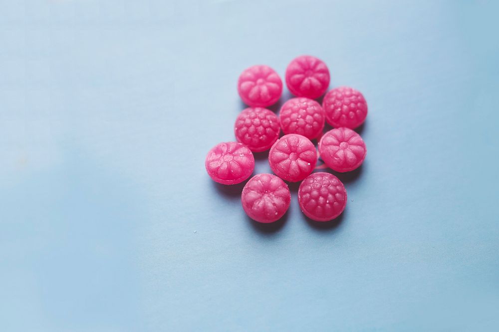 Pink candies on a table. Visit Kaboompics for more free images.