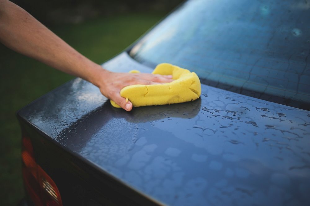 Man washing the car. Visit Kaboompics for more free images.