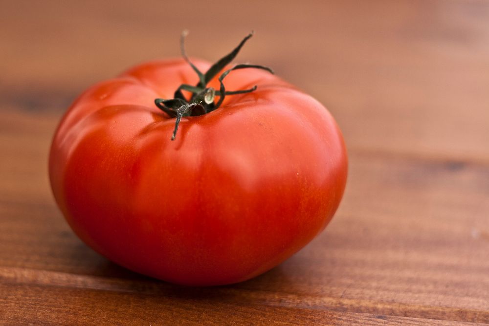 Fresh big red tomato. Visit Kaboompics for more free images.