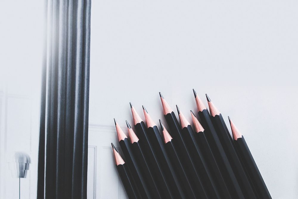 Pencils on a table. Visit Kaboompics for more free images.