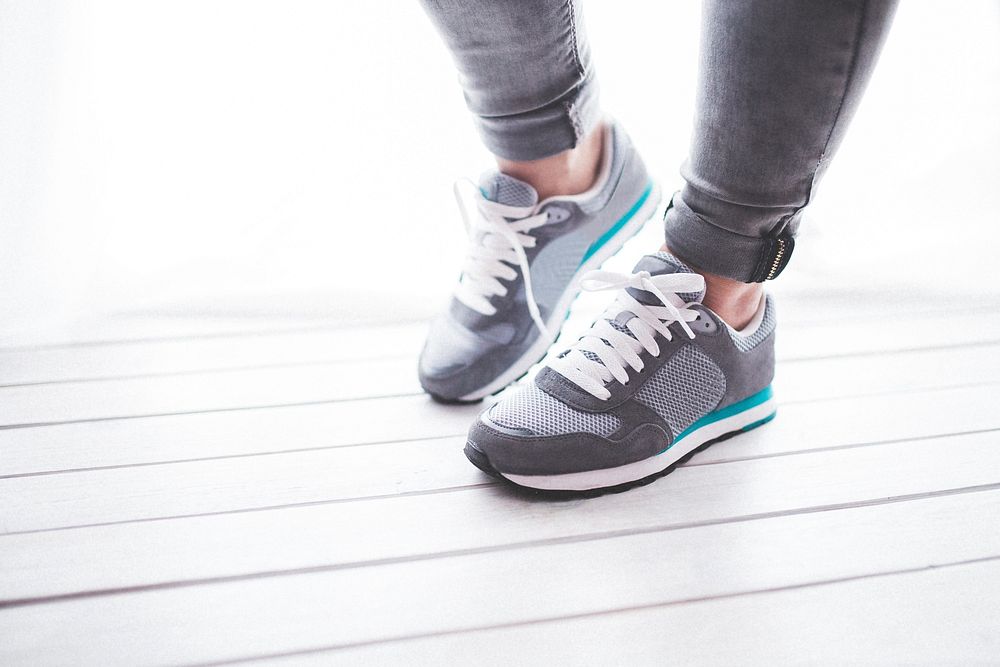 Close up of a woman in sneakers. Visit Kaboompics for more free images.