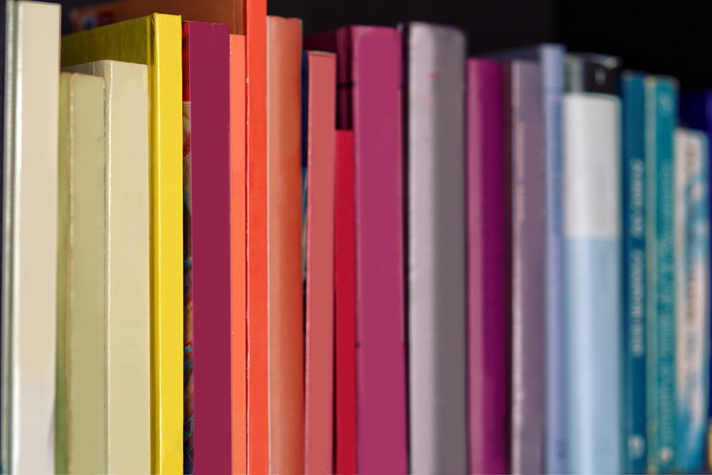 Row of colorful books. Visit Kaboompics for more free images.