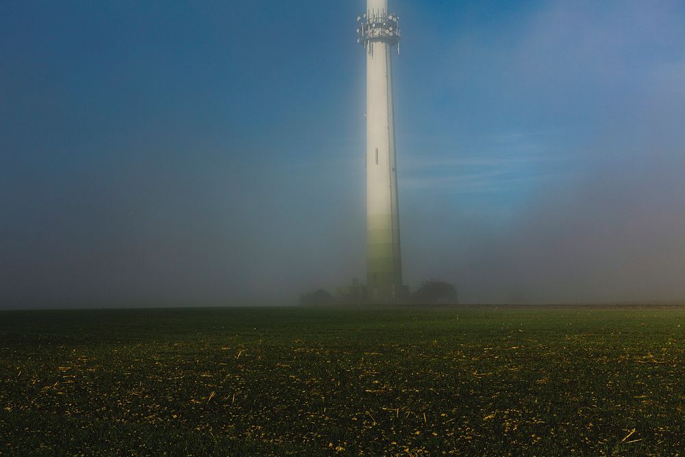 Satellite tower in a field