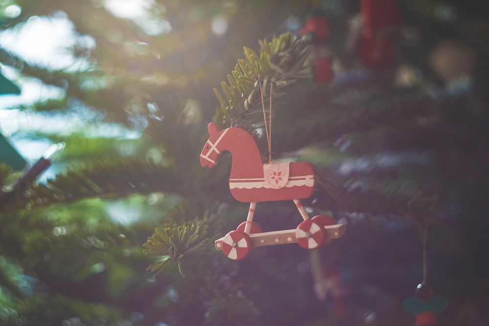 Red horse ornament in a Christmas tree