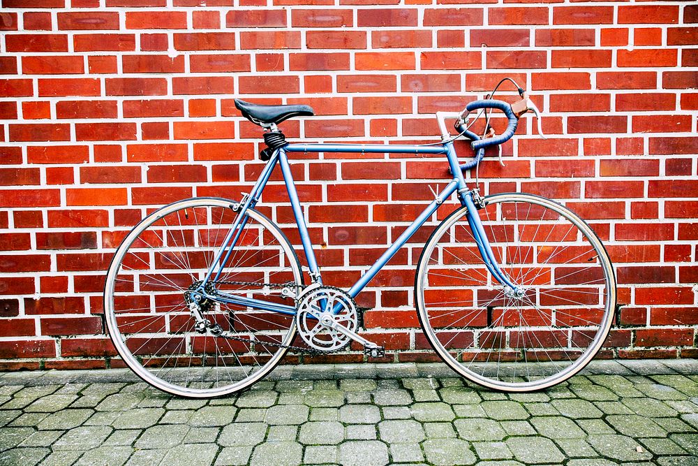 Vintage bicycle against a brick wall