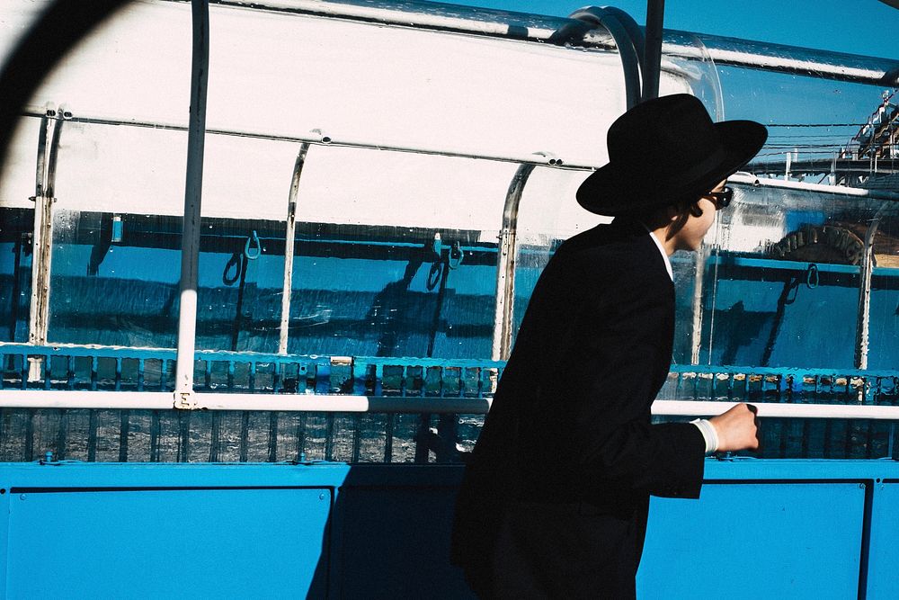 Orthodox Jewish man walking in New York City, United States