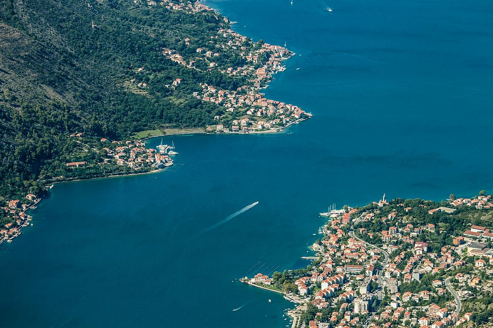 Aerial view of a bay and a populated town
