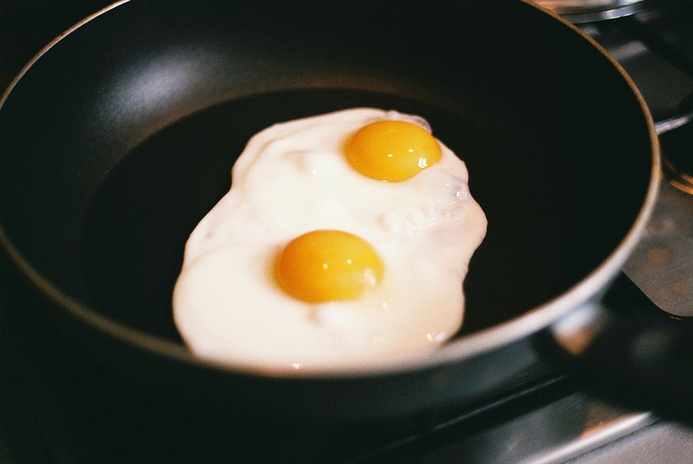 Double egg frying in a pan