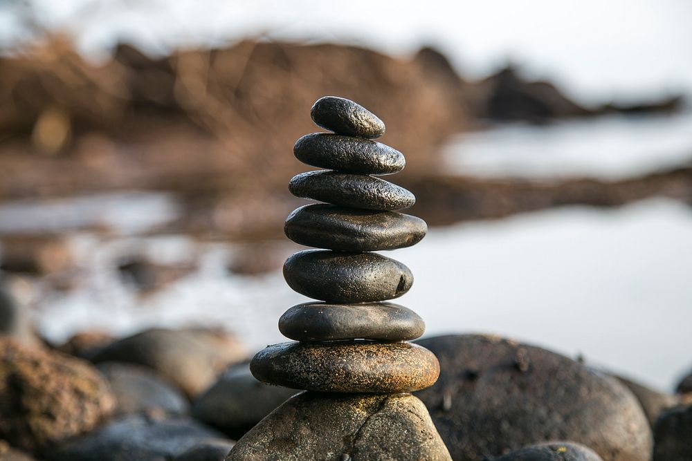 Balanced stones on a rocky beach