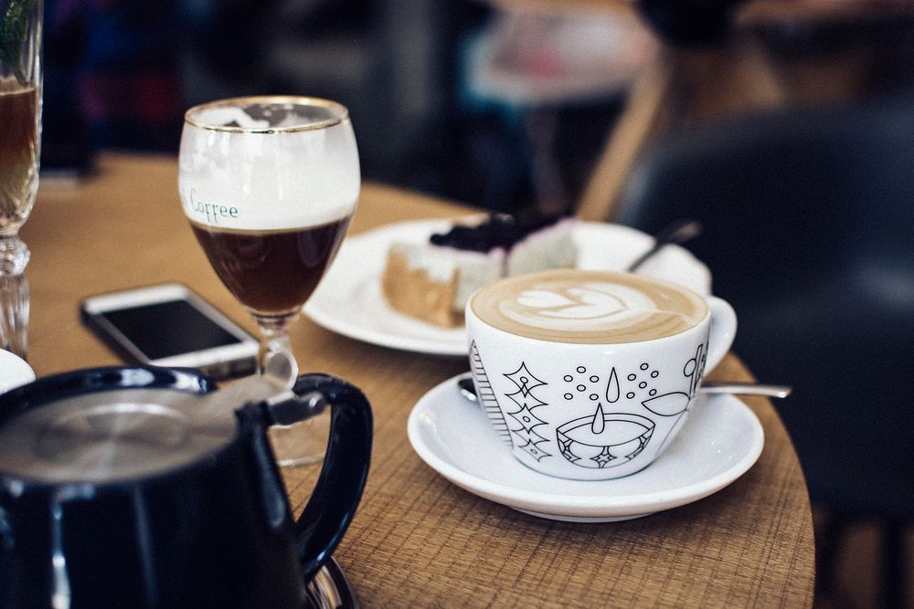 Cappuccino with latte art on a table