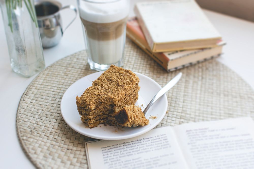 Traditional Czech honey cake with a cup of caffe latte