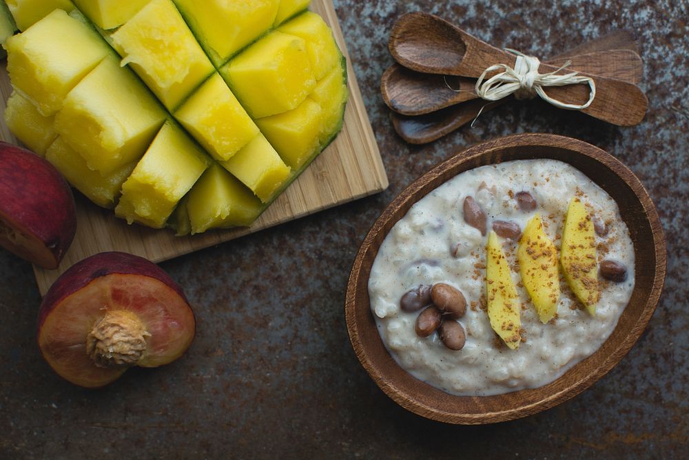Exotic coconut porridge with beans and mango
