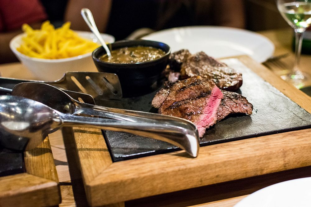 Juicy medium steak on a hot plate