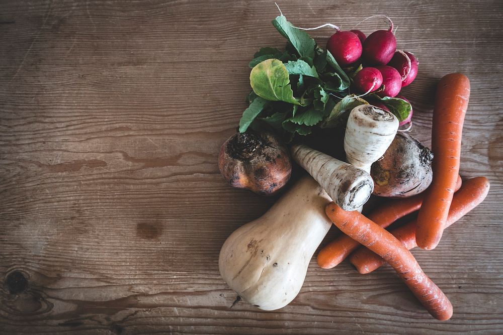 Root vegetables on a wooden table