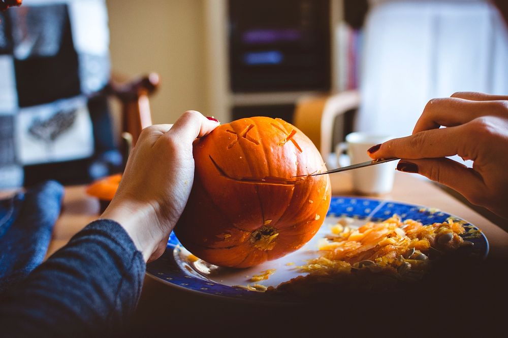 Carving a pumpkin for Halloween decoration