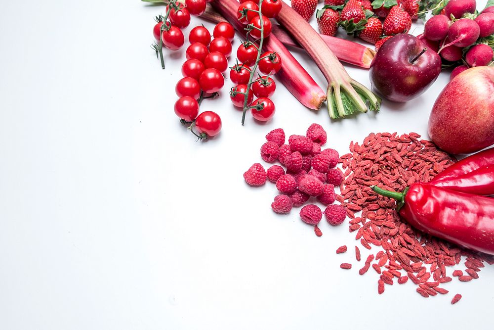 A variety of red fruits and vegetables