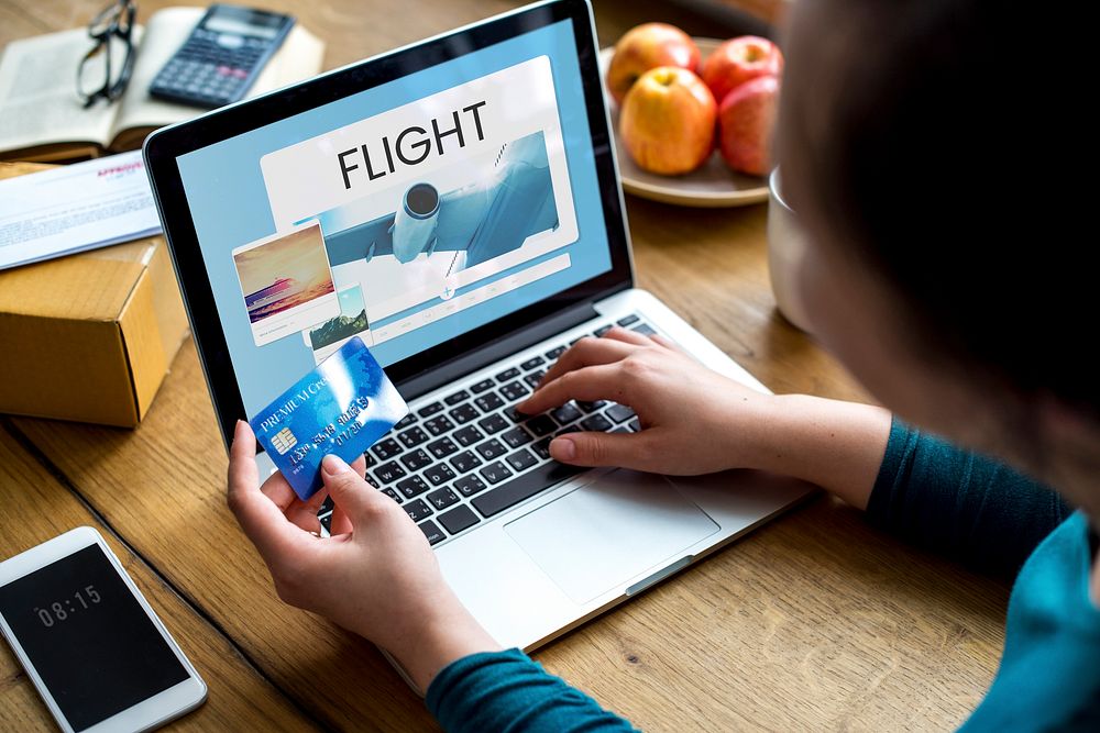Illustration of air ticket booking for travel destination on laptop