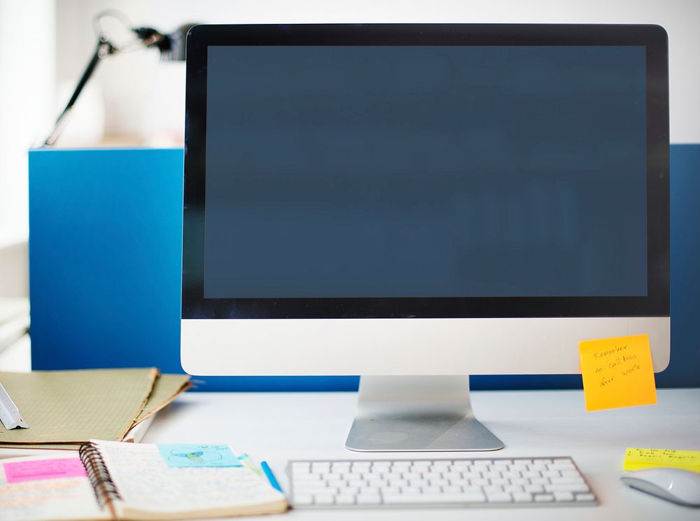 Work desk with a mockup computer screen