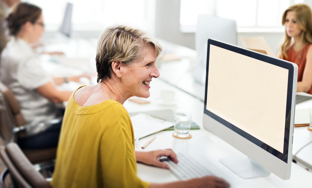 Cheerful woman using the computer