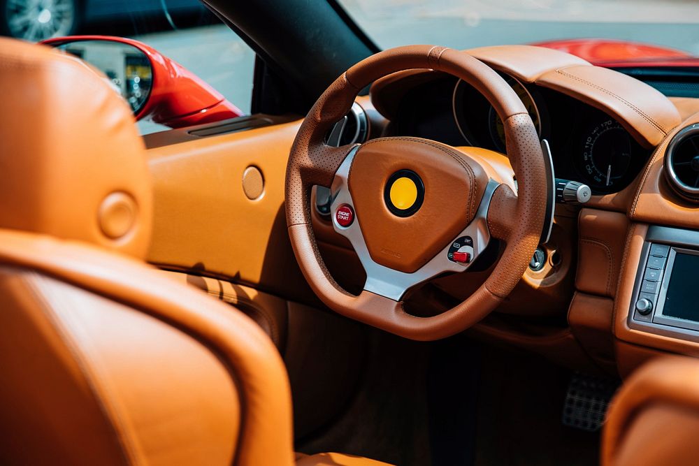 Beautiful brown stitched leather in a luxury convertible vehicle.