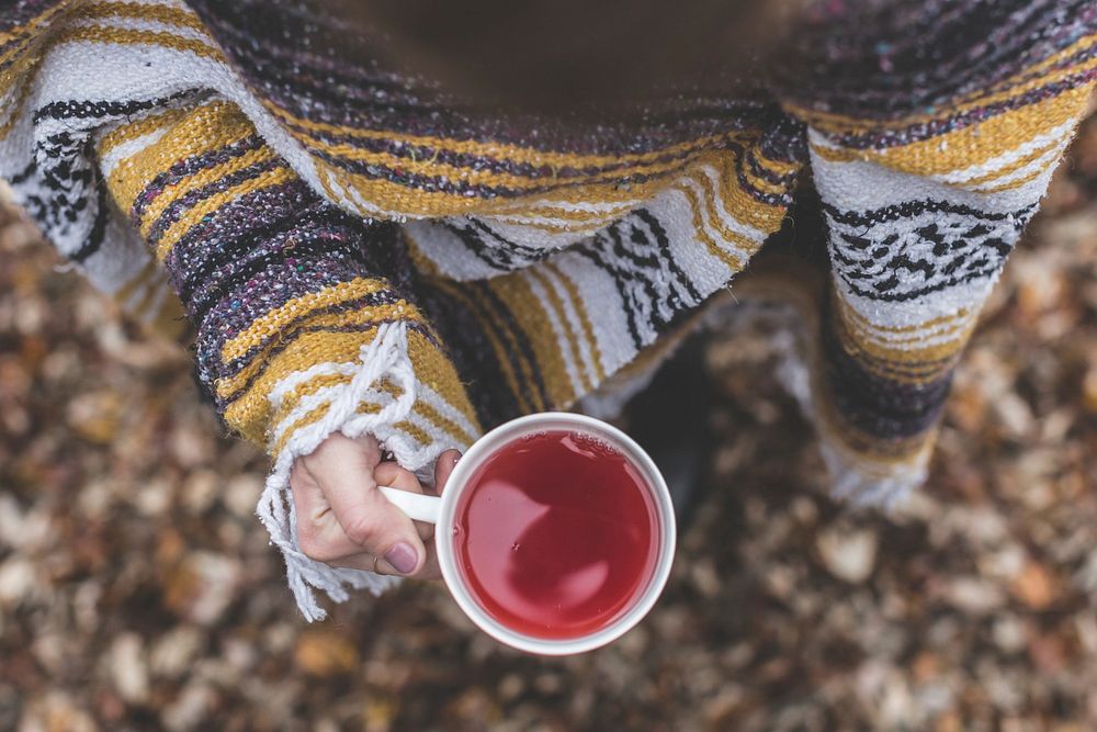 Free woman hands holding pink herbal tea cup photo, public domain beverage CC0 image.