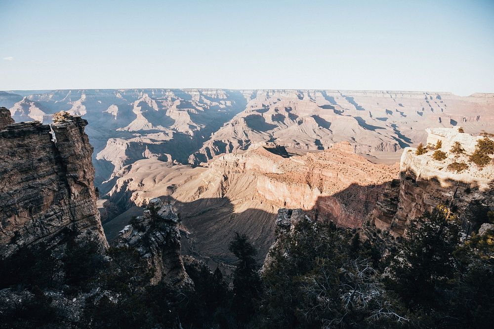 The view stretches on and one as the sun and shadows hang over this sprawling canyon.