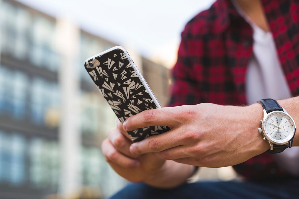 Free close-up of man using iPhone with watch on wrist image, public domain CC0 photo.