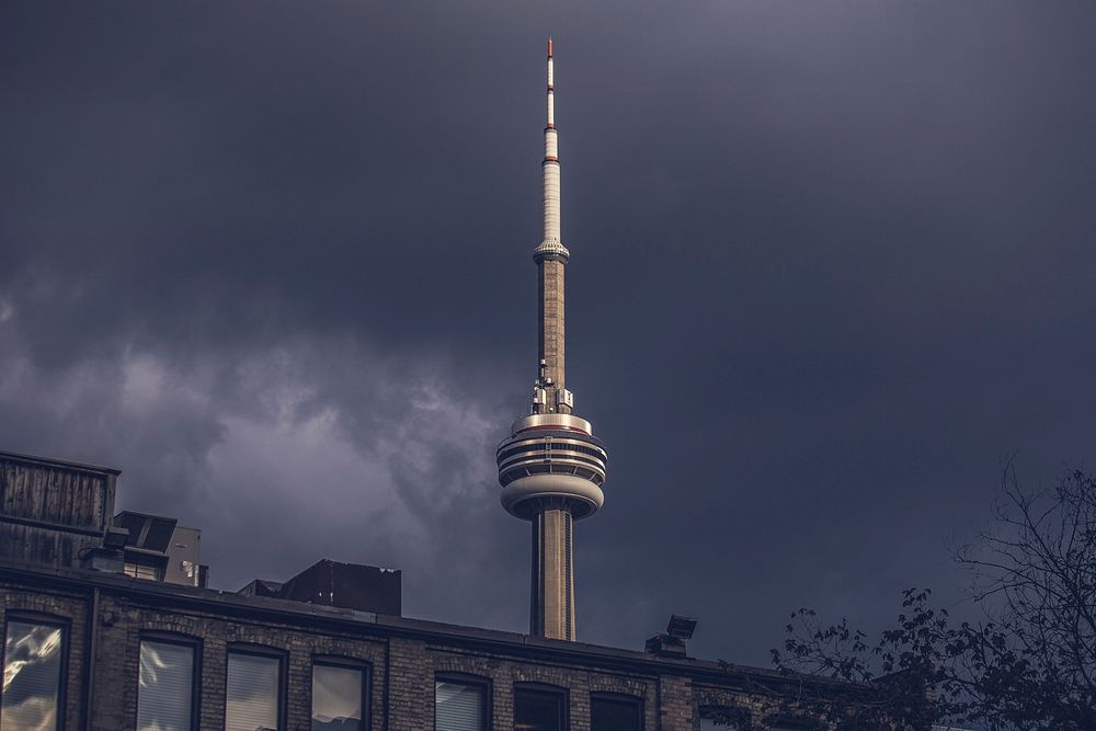 Free CN tower with stormy sky view public domain CC0 photo.