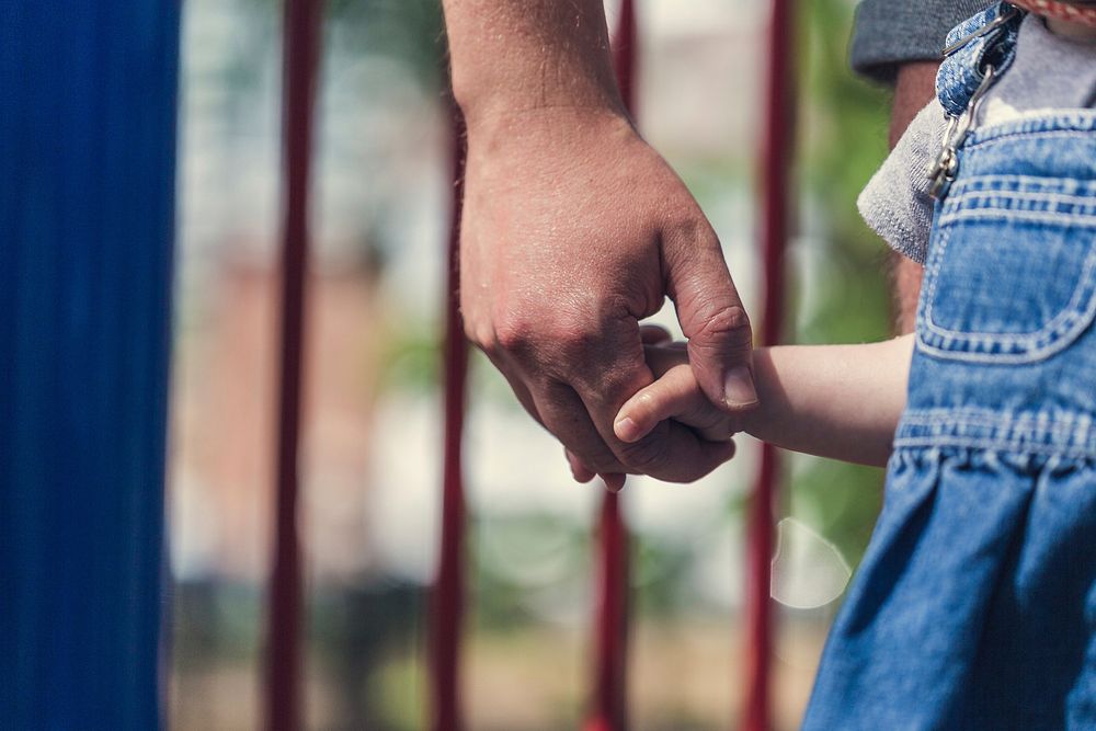 Free parent and baby holding hands outdoors image, public domain people CC0 photo.