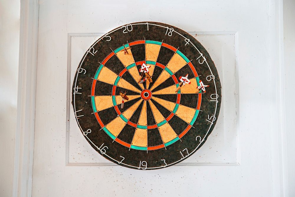 Free dartboard with darts, public domain game CC0 photo.