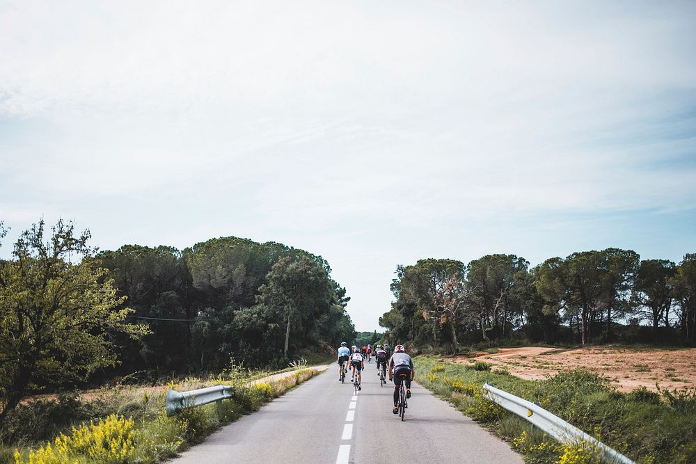 Free group of bikers racing image, public domain activity CC0 photo.