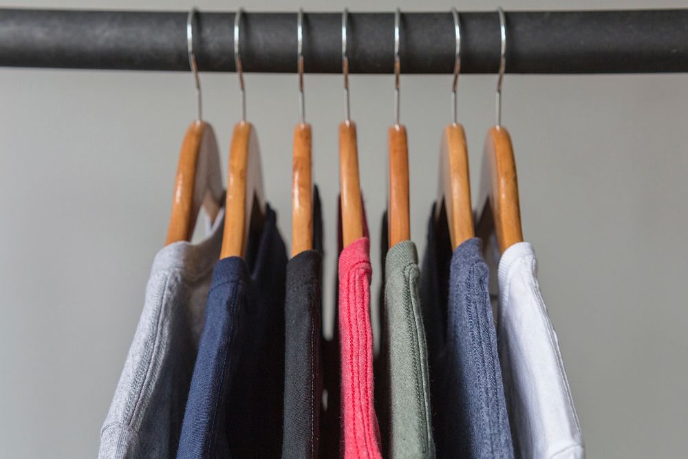 T-shirts on a hanger. Free public domain CC0 photo.