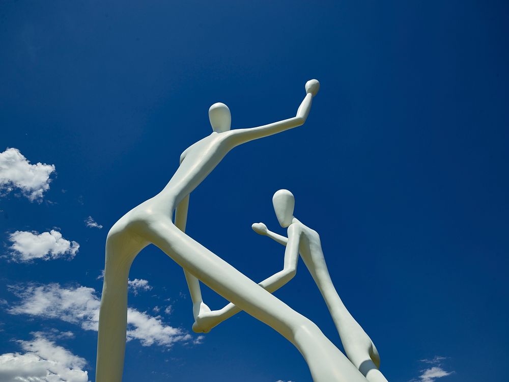 Jonathan Borofsky's sculpture, "The Dancers," outside the Center for the Performing Arts in Denver. Original image from…