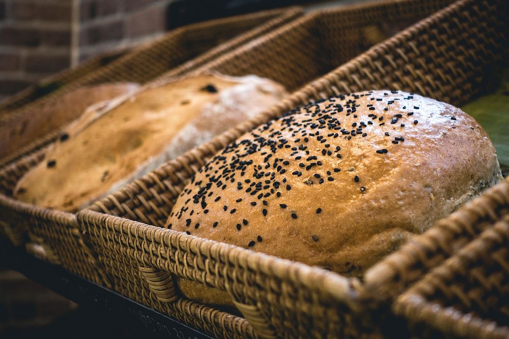 Loaf of bread with black sesame seeds in a bakery