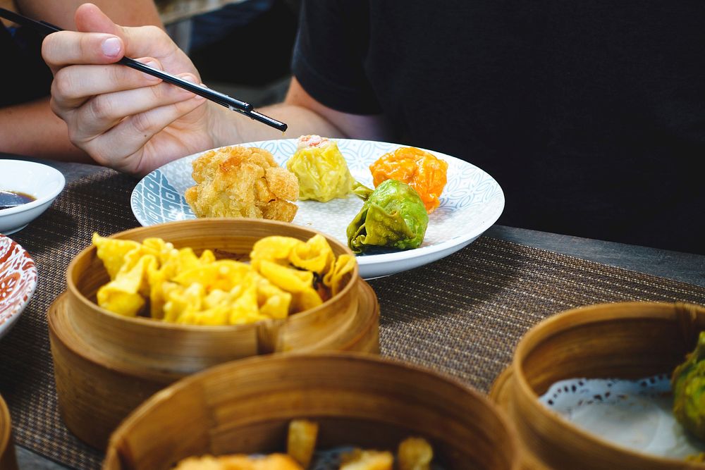 Free eating dim sum with chopsticks image, public domain food CC0 photo.